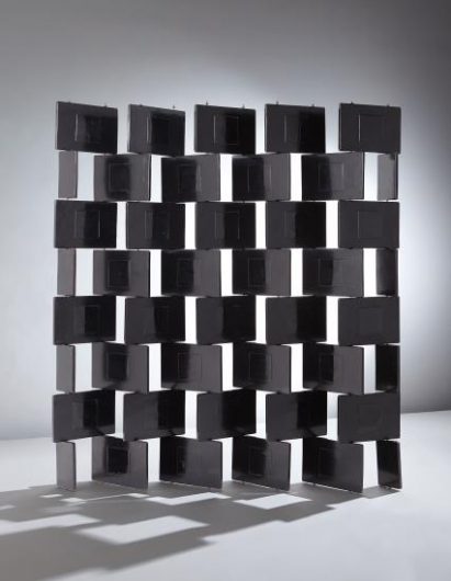 Eileen Gray, Folding 'Brick', 1925. Black lacquered wood, steel, brass. 213.4 cm (84 in.) tall, variable width, as pictured: 177.8 cm (70 in.). Each large brick: approximately 26.7 x 40 x 2 cm / Phillips